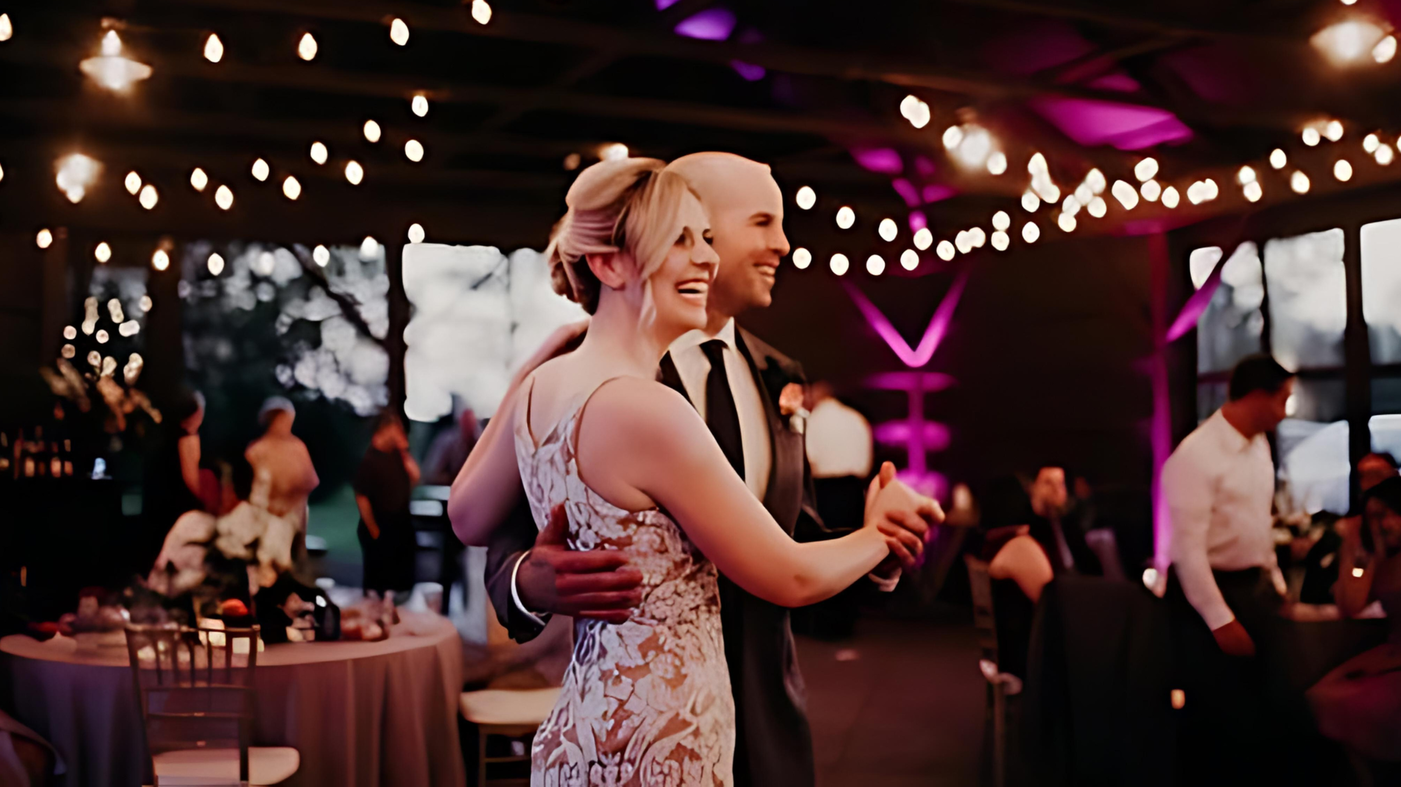 a dancing wedding couple